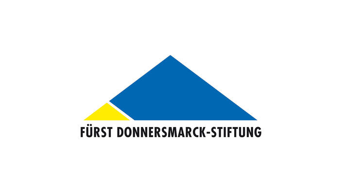 Logo von der Fürst Donnersmarck-Stiftung in den Ukraine Flaggen Farben.
